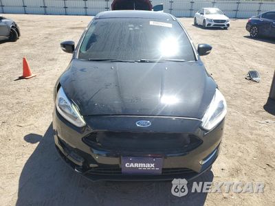 Piąte zdjęcie samochodu w środku: 2016 FORD FOCUS TITANIUM VIN:1FADP3J22GL201721 - miniatura