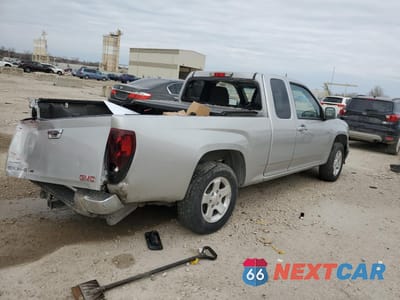 Trzecie zdjęcie samochodu z tyłu: 2012 GMC CANYON SLE VIN:1GTE5MF96C8117673 - miniatura