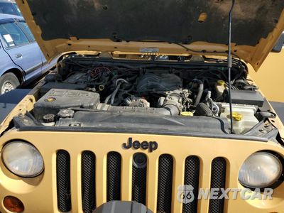 Zdjęcie 11 z 12 samochodu: 2013 JEEP WRANGLER UNLIMITED SAHARA VIN:1C4BJWEG6DL614750 - miniatura