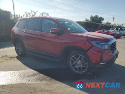 Czwarte zdjęcie samochodu z boku: 2023 HONDA PASSPORT EXL VIN:5FNYF8H51PB028482 - miniatura
