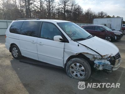 Czwarte zdjęcie samochodu z boku: 2003 HONDA ODYSSEY EXL VIN:2HKRL18983H500423 - miniatura