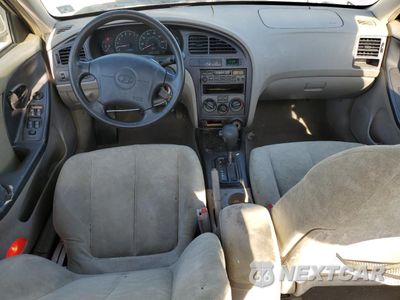 Zdjęcie 8 z 14 samochodu: 2002 HYUNDAI ELANTRA GLS VIN:KMHDN45D22U399216 - miniatura