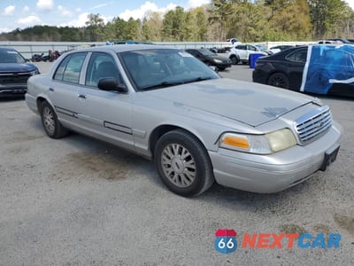 Czwarte zdjęcie samochodu z boku: 2004 FORD CROWN VICTORIA LX VIN:2FAFP74W84X128321 - miniatura