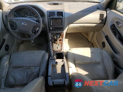 Zdjęcie 8 z 14 samochodu: 2003 NISSAN MAXIMA GLE VIN:JN1DA31A83T411224 - miniatura