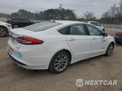 Trzecie zdjęcie samochodu z tyłu: 2017 FORD FUSION SE HYBRID VIN:3FA6P0LU0HR409265 - miniatura