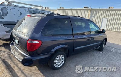 Czwarte zdjęcie samochodu z boku: 2004 DODGE GRAND CARAVAN SE VIN:1D4GP24R44B519600 - miniatura