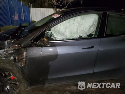 Zdjęcie 7 z 12 samochodu: 2023 TESLA MODEL Y VIN:7SAYGDEF7PF857840 - miniatura