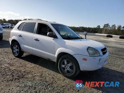 Czwarte zdjęcie samochodu z boku: 2006 HYUNDAI TUCSON GL VIN:KM8JM12B26U252438 - miniatura