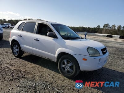 Czwarte zdjęcie samochodu z boku: 2006 HYUNDAI TUCSON GL VIN:KM8JM12B26U252438 - miniatura