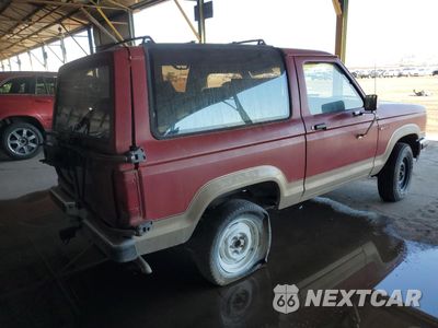 Trzecie zdjęcie samochodu z tyłu: 1990 FORD BRONCO II VIN:1FMCU12T1LUA11502 - miniatura