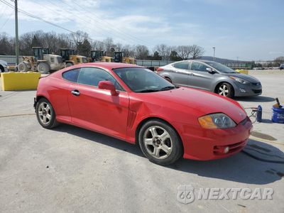 Czwarte zdjęcie samochodu z boku: 2004 HYUNDAI TIBURON VIN:KMHHM65D14U105288 - miniatura