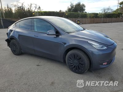 Czwarte zdjęcie samochodu z boku: 2023 TESLA MODEL Y VIN:7SAYGDEE8PA075695 - miniatura