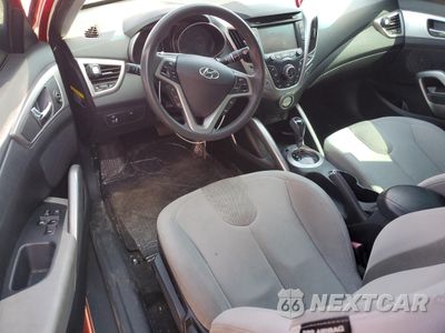 Zdjęcie 8 z 12 samochodu: 2012 HYUNDAI VELOSTER VIN:KMHTC6AD6CU042853 - miniatura
