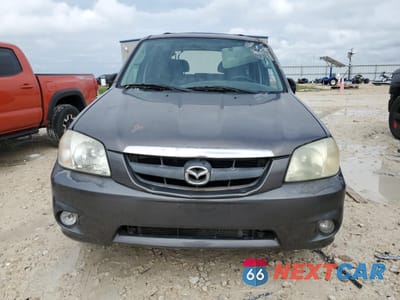 Piąte zdjęcie samochodu w środku: 2004 MAZDA TRIBUTE LX VIN:4F2YZ041X4KM11363 - miniatura