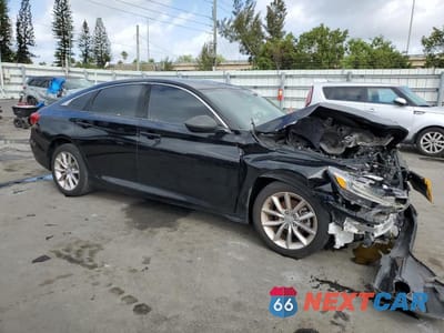 Czwarte zdjęcie samochodu z boku: 2022 HONDA ACCORD LX VIN:1HGCV1F16NA043314 - miniatura