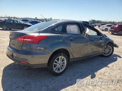 Trzecie zdjęcie samochodu z tyłu: 2016 FORD FOCUS SE VIN:1FADP3F22GL373790 - miniatura