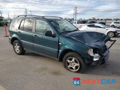 Czwarte zdjęcie samochodu z boku: 1999 MERCEDES-BENZ ML 320 VIN:4JGAB54EXXA135939 - miniatura