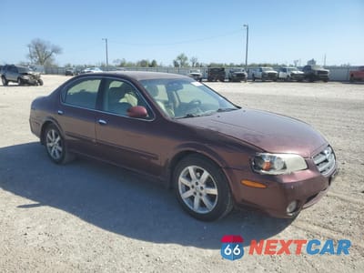 Czwarte zdjęcie samochodu z boku: 2002 NISSAN MAXIMA GLE VIN:JN1DA31D42T439353 - miniatura