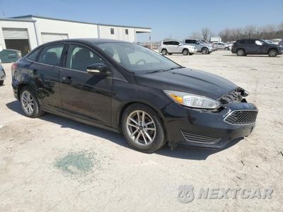 Czwarte zdjęcie samochodu z boku: 2017 FORD FOCUS SE VIN:1FADP3F21HL342760 - miniatura