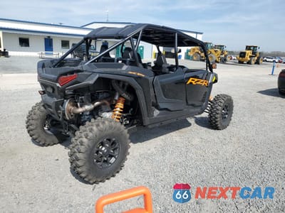 Czwarte zdjęcie samochodu z boku: 2024 POLARIS RZR XP 4 1000 PREMIUM VIN:3NSNMC99XRF041861 - miniatura