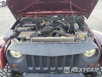 Zdjęcie 12 z 14 samochodu: 2009 JEEP WRANGLER UNLIMITED SAHARA VIN:1J4GA59119L770086 - miniatura