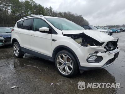 Czwarte zdjęcie samochodu z boku: 2017 FORD ESCAPE TITANIUM VIN:1FMCU9JD0HUB27824 - miniatura
