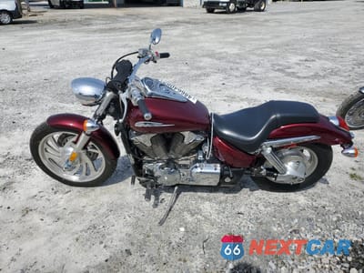Trzecie zdjęcie samochodu z tyłu: 2006 HONDA VTX1300 C VIN:1HFSC55086A207427 - miniatura