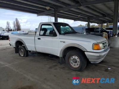 Czwarte zdjęcie samochodu z boku: 1993 FORD RANGER VIN:1FTCR11U3RPC53988 - miniatura