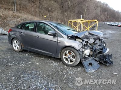 Czwarte zdjęcie samochodu z boku: 2014 FORD FOCUS SE VIN:1FADP3F2XEL231927 - miniatura