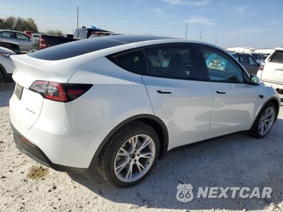 Trzecie zdjęcie samochodu z tyłu: 2023 TESLA MODEL Y VIN:7SAYGDEE7PA078488 - miniatura