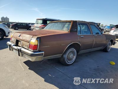 Trzecie zdjęcie samochodu z tyłu: 1984 OLDSMOBILE DELTA 88 ROYALE BROUGHAM VIN:1G3AY69YXE9725875 - miniatura