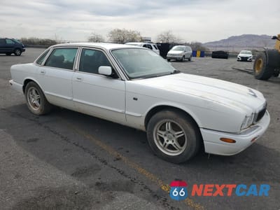 Czwarte zdjęcie samochodu z boku: 1999 JAGUAR XJ8 VIN:SAJHX1048XC861105 - miniatura