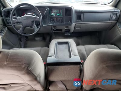 Zdjęcie 8 z 13 samochodu: 2005 GMC YUKON XL C1500 VIN:1GKEC16Z55J158395 - miniatura