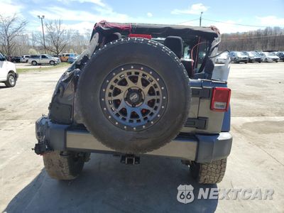 Zdjęcie 6 z 13 samochodu: 2017 JEEP WRANGLER UNLIMITED SAHARA VIN:1C4BJWEG4HL537978 - miniatura