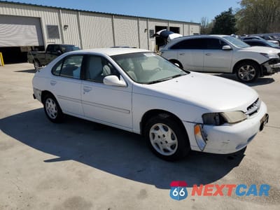 Czwarte zdjęcie samochodu z boku: 1999 NISSAN ALTIMA XE VIN:1N4DL01D5XC203412 - miniatura