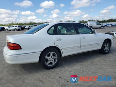 Trzecie zdjęcie samochodu z tyłu: 1999 TOYOTA AVALON XL VIN:4T1BF18B7XU300829 - miniatura