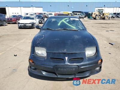 Piąte zdjęcie samochodu w środku: 2000 PONTIAC SUNFIRE GT VIN:1G2JD12T8Y7345645 - miniatura