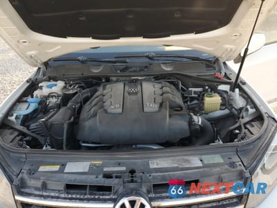 Zdjęcie 14 z 15 samochodu: 2014 VOLKSWAGEN TOUAREG V6 TDI VIN:WVGEP9BP0ED001256 - miniatura