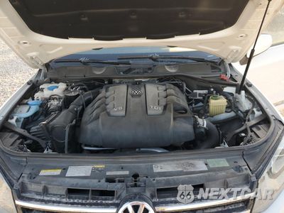 Zdjęcie 14 z 15 samochodu: 2014 VOLKSWAGEN TOUAREG V6 TDI VIN:WVGEP9BP0ED001256 - miniatura