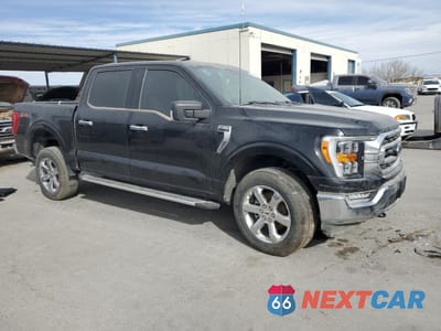 Czwarte zdjęcie samochodu z boku: 2023 FORD F150 SUPERCREW VIN:1FTFW1E89PKD68074 - miniatura