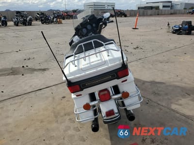 Czwarte zdjęcie samochodu z boku: 2007 HARLEY-DAVIDSON FLHTCUI VIN:1HD1FC41X7Y703882 - miniatura