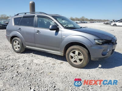 Czwarte zdjęcie samochodu z boku: 2010 MITSUBISHI OUTLANDER ES VIN:JA4AT2AW9AZ015713 - miniatura