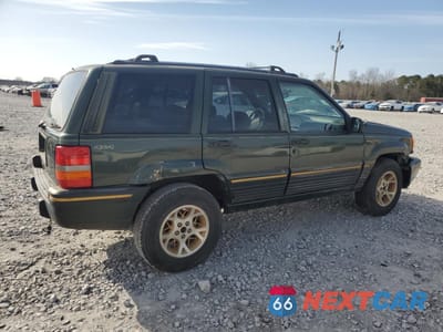 Trzecie zdjęcie samochodu z tyłu: 1995 JEEP GRAND CHEROKEE LIMITED VIN:1J4GZ78SXSC509348 - miniatura
