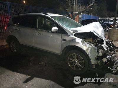 Czwarte zdjęcie samochodu z boku: 2017 FORD ESCAPE SE VIN:1FSCU9G90HUA39911 - miniatura