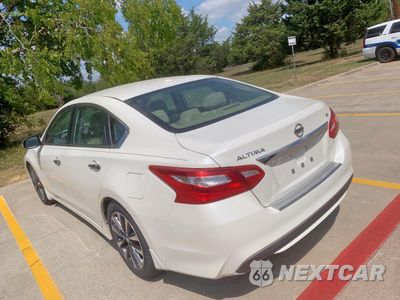 Trzecie zdjęcie samochodu z tyłu: 2016 NISSAN ALTIMA 2.5 VIN:1N4AL3AP3GC242644 - miniatura