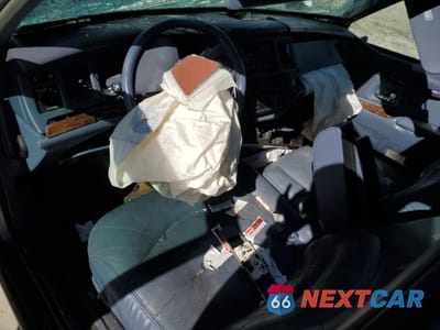 Zdjęcie 8 z 13 samochodu: 1997 LINCOLN TOWN CAR SIGNATURE VIN:1LNLM82W1VY642362 - miniatura