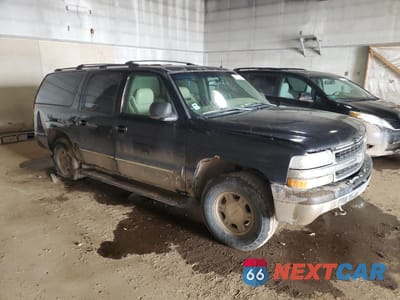 Czwarte zdjęcie samochodu z boku: 2002 CHEVROLET SUBURBAN K1500 VIN:1GNFK16Z62J185806 - miniatura