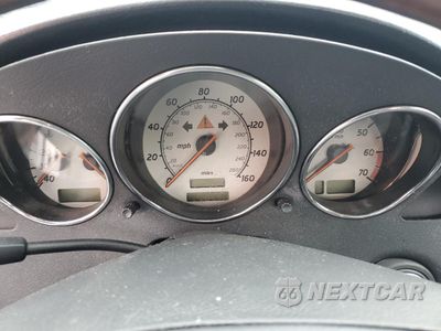 Zdjęcie 9 z 13 samochodu: 2002 MERCEDES-BENZ SLK 320 VIN:WDBKK65F42F250018 - miniatura