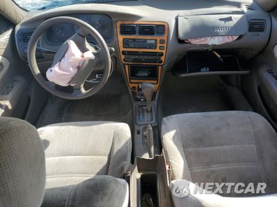 Zdjęcie 8 z 12 samochodu: 1997 TOYOTA COROLLA DX VIN:1NXBB02E2VZ591343 - miniatura