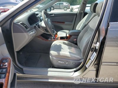 Zdjęcie 7 z 12 samochodu: 2004 TOYOTA CAMRY LE VIN:4T1BE32K34U801624 - miniatura